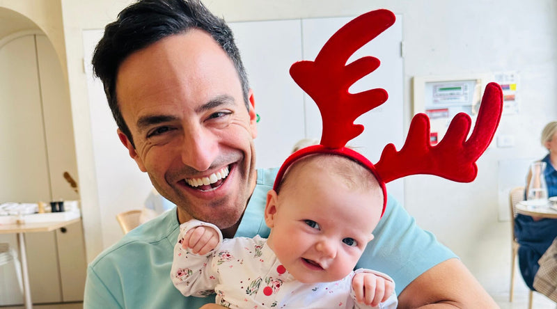 baby wearing festive hat