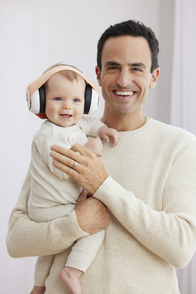 dr golly holding a baby