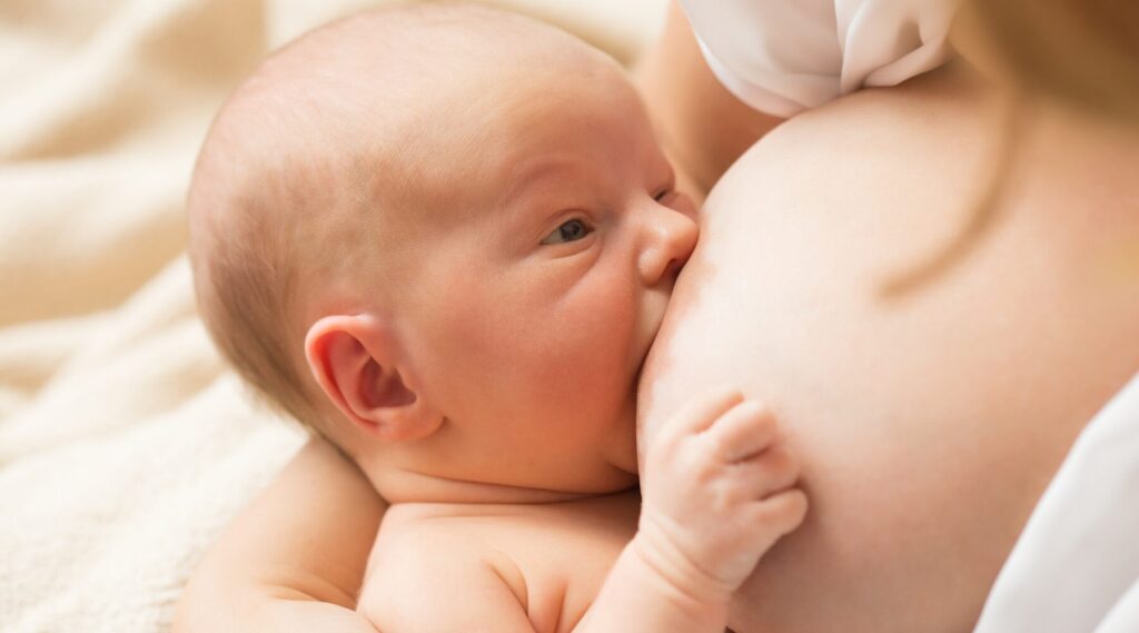 mom breastfeeding baby